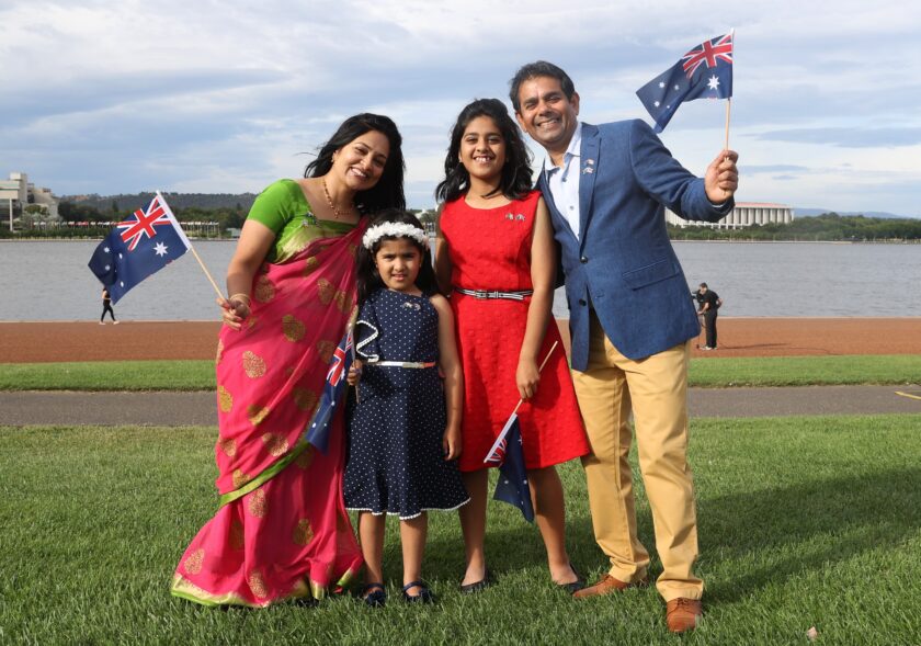family holding Australian flags